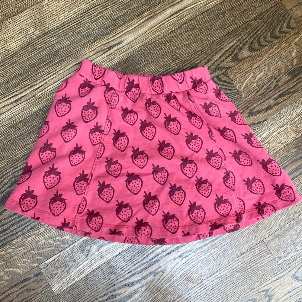 Tea brand girls strawberry skirt. Size tag cut out but I would say 4-5T.